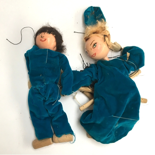 1038 - Two vintage handmade wooden puppets