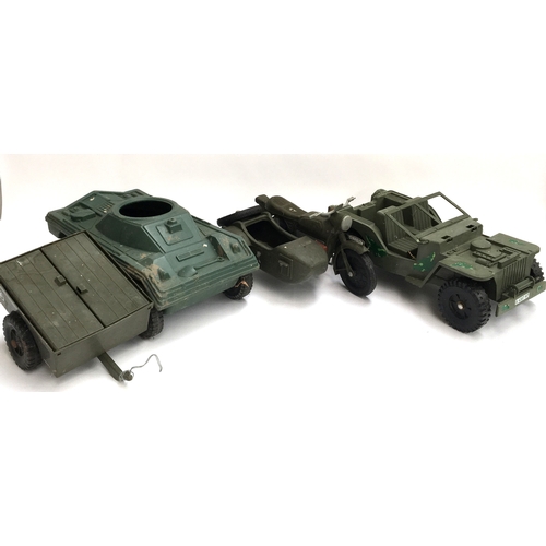 1067 - A selection of large plastic military vehicle models, to include a motorcycle and sidecar, wagon, tr... 