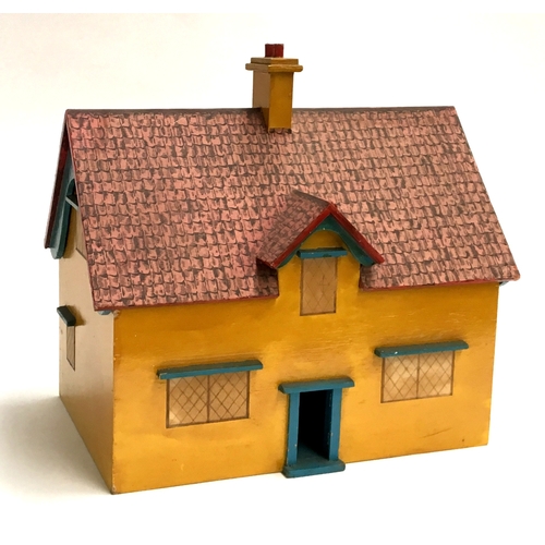 1023 - A wooden painted dolls house with removable roof