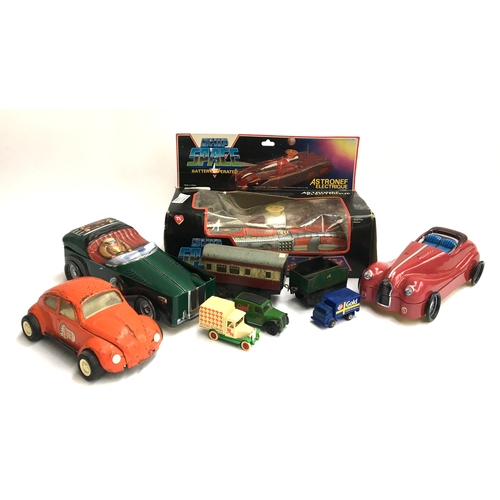 943 - A Tonka VW Beetle Twinkle Toes; together with metal car storage tins, two Lledo car models, a Matchb... 