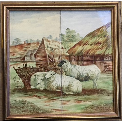 72 - A framed set of four tiles depicting sheep at rest, 30x30cm