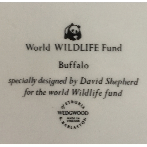 76 - A set of six Wedgwood plates designed by David Shepherd for the World Wildlife Fund, 26.5cm