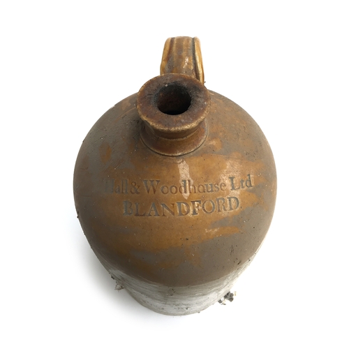 94 - A stoneware flagon, 'Hall & Woodhouse ltd., Blandford', 38.5cmH