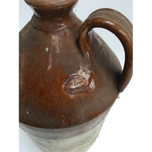 97 - A large stoneware loop handle flagon, by Doulton & Co, Lambeth, 40cmH