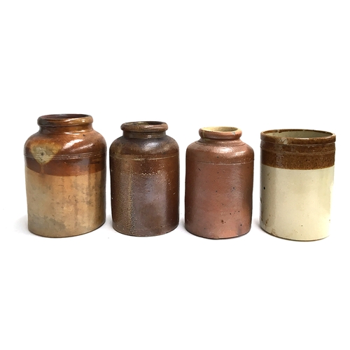 101 - Four large stoneware storage jars, the largest 28cmH