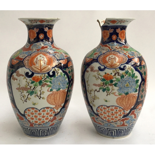 83 - A pair Imari vases (af), each 23cmH