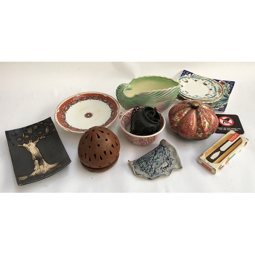 84 - A mixed box of ceramics to include a Sylvac shell vase, dog figurines, Tenmoku, Staffordshire etc