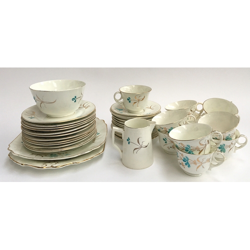 88 - A ceramic tea set, decorated with blue and gilt floral design