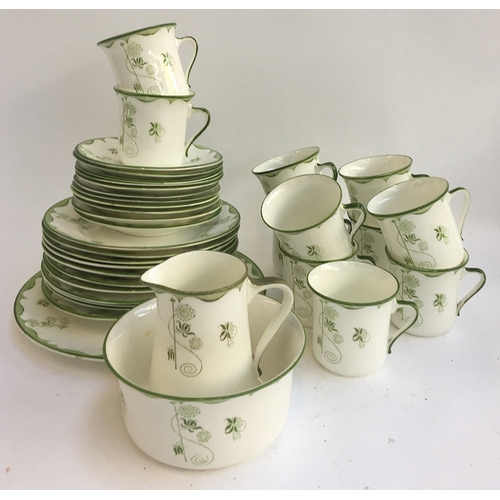 117 - A Blair china green and white part tea set to include tea cups, saucers, plates, milk jug, sugar bow... 