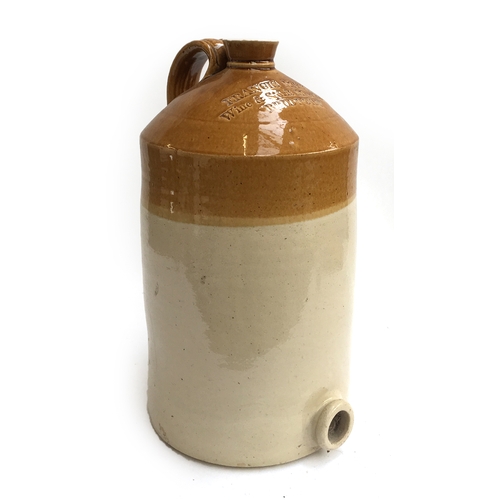 121 - A stoneware flagon with loop handle, marked 'Francis Mason, Wine & Spirit Merchant, Bridport', 49cmH