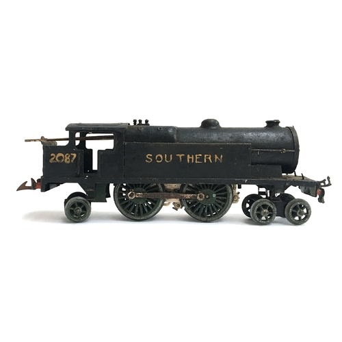 902 - Two repainted clockwork O gauge trains (af); together with a tin plate clockwork 'Royal Scot 7171' t... 