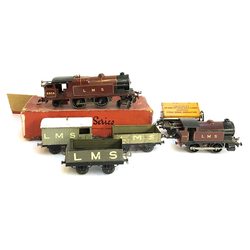 895 - A mixed lot of Hornby O gauge, to include a boxed No.2 LMS 6954 Special Tank Loco; LMS 2270 loco, cl... 