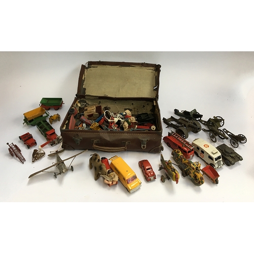 935 - A large quantity of metal toys, to include clockwork tin plate car, clockwork plane and motorcycle, ... 