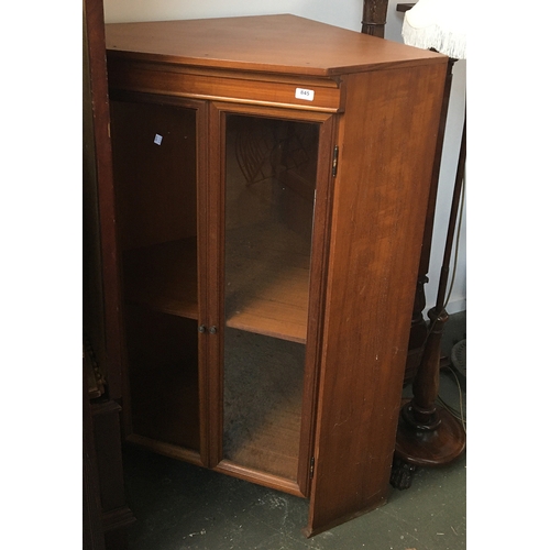 845 - A glazed teak cabinet, 100cmW