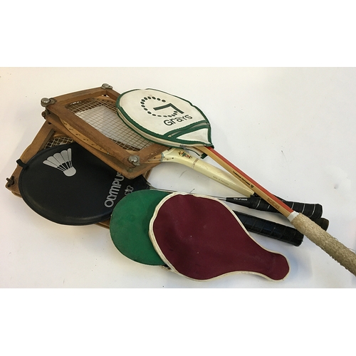 1086 - A quantity of vintage tennis and squash rackets with stretchers;  together with ping pong and badmin... 