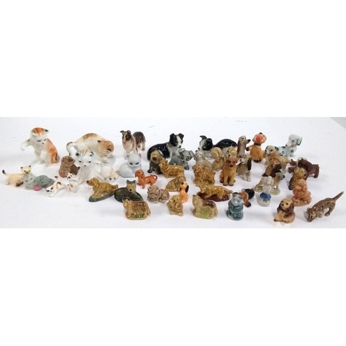 132 - A collection of Wade and other whimsies, mainly dogs and cats, approx. 40