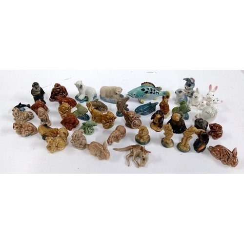 135 - A collection of Wade and other whimsies, mainly exotic and aquatic animals, to include polar bears, ... 