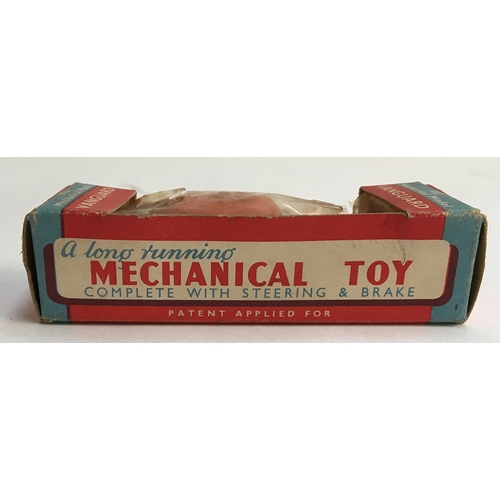 1049 - A Mettoy Mechanical Model 502 'Vanguard', 'A realistic mechanical toy complete with steering & brake... 