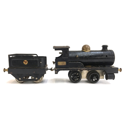 887 - An early Hornby O gauge clockwork loco no. 2710, c.1920; together with tender (af)