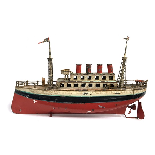 1000 - Carette style tinplate clockwork four funnel Ocean Liner, early 20th century, the hull painted in re... 