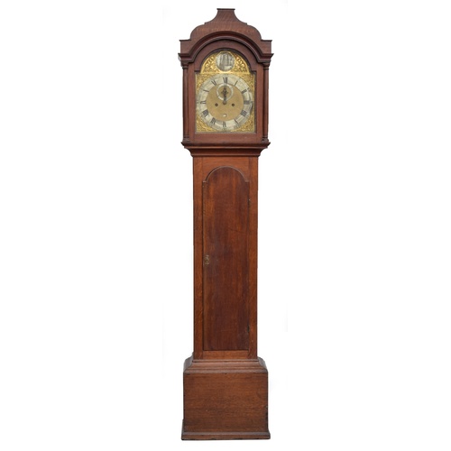 579 - An oak cased longcase clock by Jn. Christian of Aylsham, arched brass dial with silvered circular pl... 