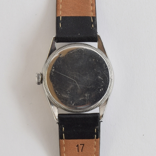 100 - A Rolex Oyster stainless steel gent's wrist watch
c. 1940, silvered dial with Arabic and Roman numer... 