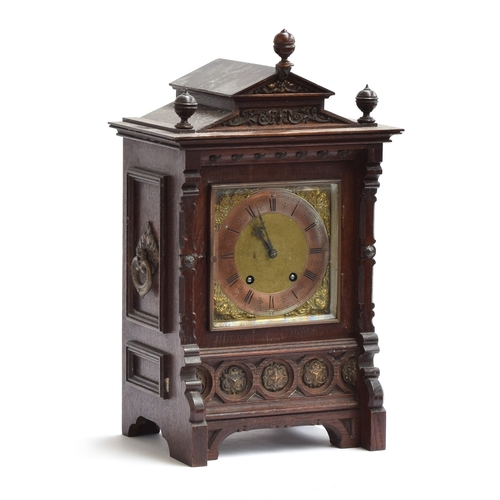 108 - A late 19th century German oak cased mantel clock, by Lenzkirch, architectural case with pediment to... 