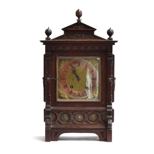 108 - A late 19th century German oak cased mantel clock, by Lenzkirch, architectural case with pediment to... 