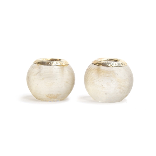 79 - A pair of early 20th century silver mounted spherical glass match-strikers, marks rubbed, 5.5cm high