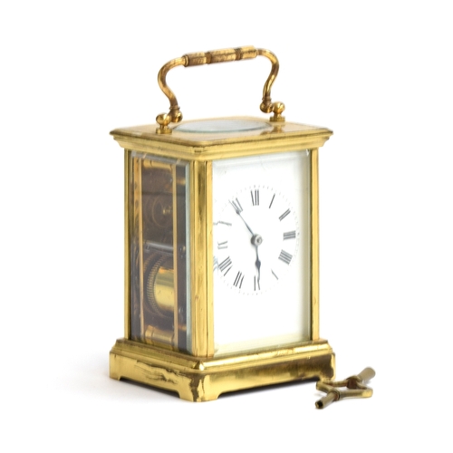 109 - A French gilt metal carriage clock, Roman numerals to enamel dial, with key, 11.5cm high