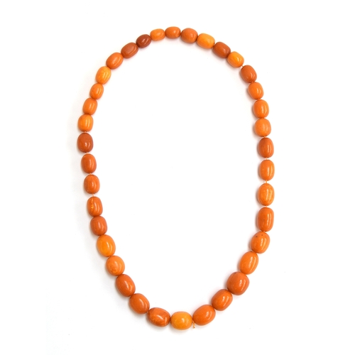 93 - An amber necklace (approx 169g) purchased in Jerusalem 1918, beads approx 2.5cm x 1.75cm with variat... 