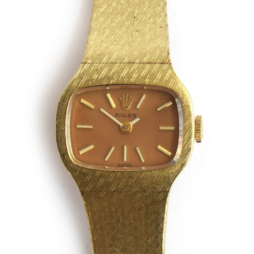 100A - A 14ct gold ladies Rolex wrist watch, with mesh strap, the clip marked 'RW Co. 585', approximately 2... 