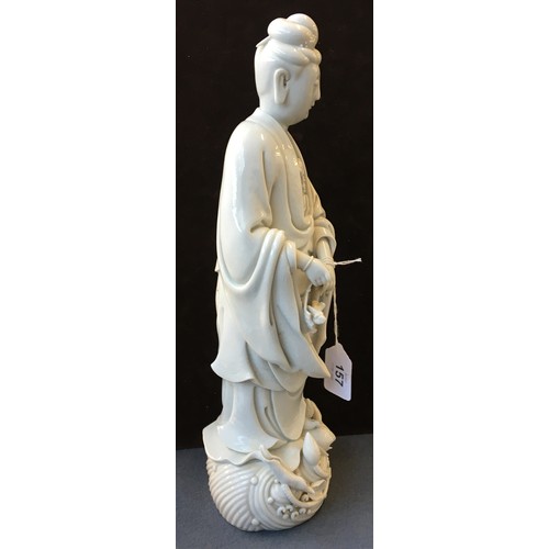 157 - A Chinese blanc de Chine porcelain figure of Guanyin, the Bodhisattva of Compassion (af), 36.5cm hig... 