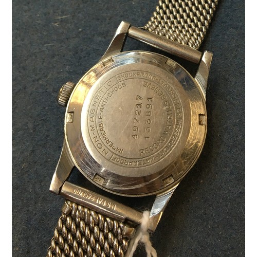 99 - A Record Watch Co. gent's stainless steel wrist watch
c.1960s, champagne dial with luminous Arabic n... 