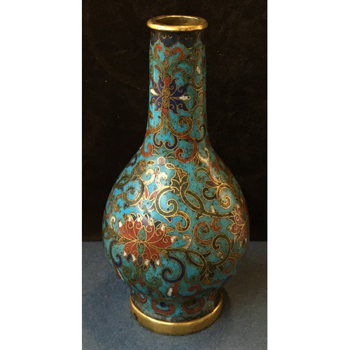 154 - A small 18th century enamelled Chinese cloisonné vase, decorated with a scrolling lotus on a turquoi... 