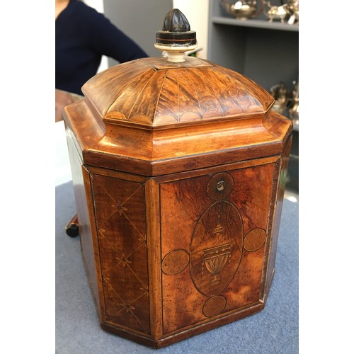 119 - A George III marquetry and parquetry tea caddy, of canted square form, with lined interior and inter... 