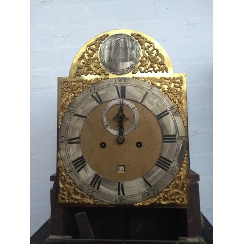 579 - An oak cased longcase clock by Jn. Christian of Aylsham, arched brass dial with silvered circular pl... 