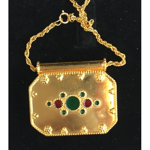 17 - Pendant marked 21c  and chain marked 21K, gross weight 17g