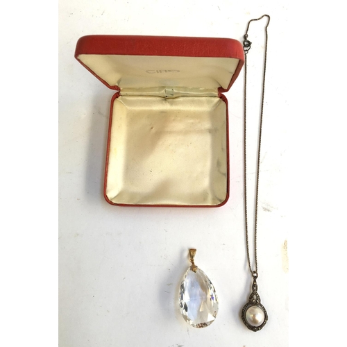 18 - Large cut glass pendant in 9ct gold setting together with marcasite and pearl pendant