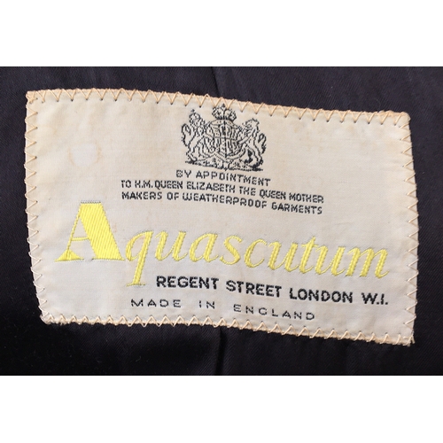 592 - A gent's Aquascutum single breasted navy wool overcoat, single vent to rear, approx. 38