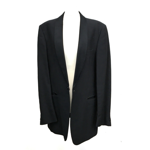 594 - A gent's black tie jacket and trousers by Moss Bros., 38