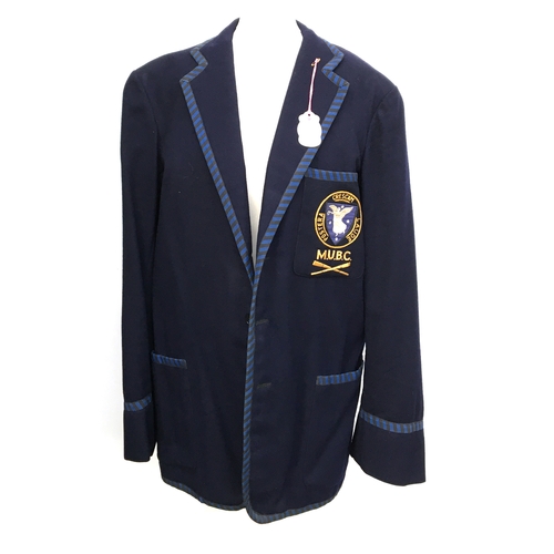 604 - A navy wool boating blazer tailored by Ball & Welch, Melbourne, bearing the crest of the Melbourne U... 