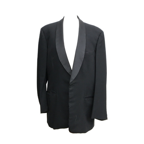 606 - A Moss Bros. dinner jacket with pleated trousers, approx. 38