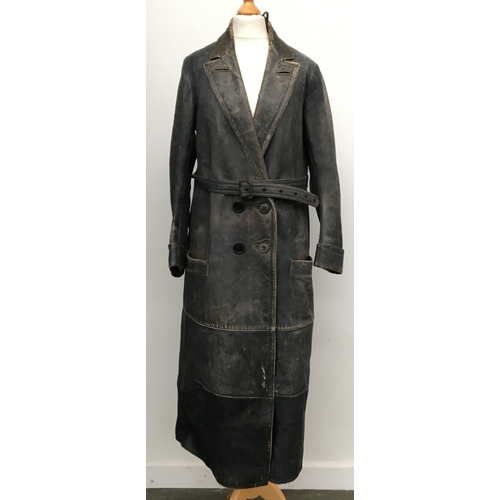 616 - A Berryware double breasted leather coat, wool lined, with belt, 26-28