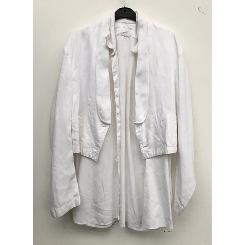 617 - A white linen Royal Navy shirt; mess jacket; and short sleeved shirt/smock top