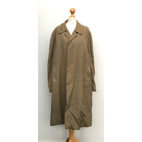 621 - A gent's single breasted Burberry raincoat, with burrella cheque lining