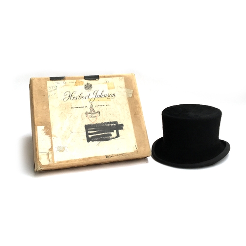 551 - An S. Patey (London) Ltd., silk top hat, approx. size 7, in a Herbert Johnson hat box