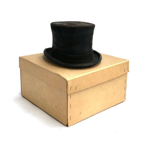 555 - A Locke & Co. silk top hat, approx. size 6 1/2, in hat box