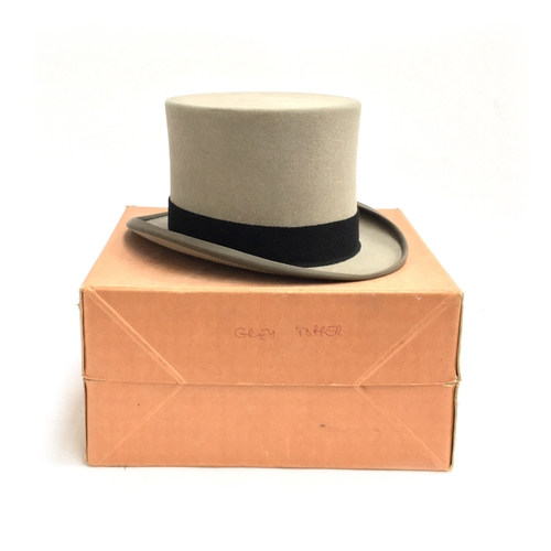 556 - A Moss Bros. grey top hat, size 7 1/4, in hat box