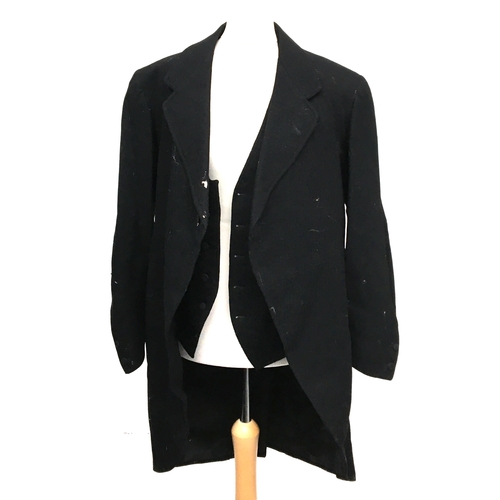 624 - A gent's morning suit, as found, with black waistcoat and striped trousers